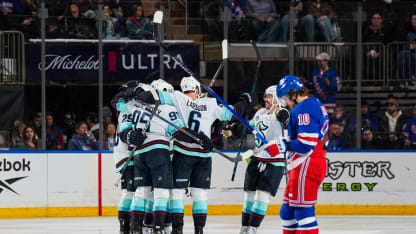 Vince Dunn #29 of the Seattle Kraken celebrates with teammates after scoring a goal in the third period against the New York Rangers at Madison Square Garden on December 8, 2024 in New York City. (Photo by Jared Silber/NHLI via Getty Images)