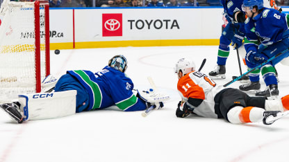 Konecny scores while falling