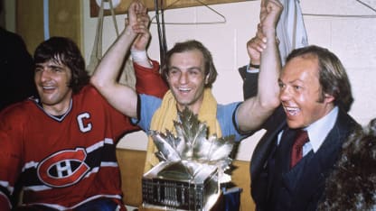 Serge Savard #18, Guy LaFleur #10, and Yvon Cournoyer of the Montreal Canadiens pose in locker room with the Conn Smythe Trophy awarded to LaFleur after defeating the Boston Bruins in Game 4 of the Stanley Cup Final at the Boston Garden on May 14, 1977 in Boston, MA. (Photo by Denis Brodeur/NHLI via Getty Images)