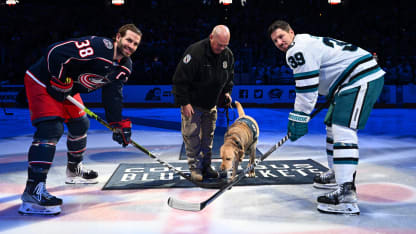simon columbus police therapy dog drops the puck at blue jackets game
