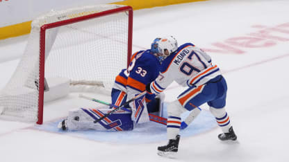 Edmonton Oilers Center Connor McDavid (97) takes a shot on New York Islanders Goalie David Rittich (33) during the second period of a National Hockey League game between the Edmonton Oilers and the New York Islanders on October 16, 2025, at UBS Arena in Elmont, NY. (Photo by Gregory Fisher/Icon Sportswire via Getty Images)