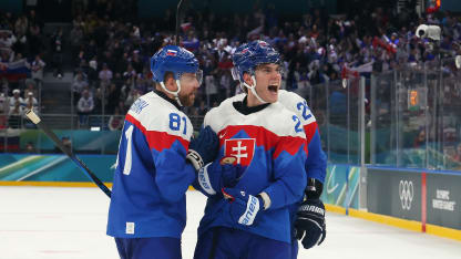 MILAN, ITALY - FEBRUARY 11: Adam Ruzicka #21 of Team Slovakia celebrates with teammates after a goal in the third period during the Men's Preliminary Group B match between Slovakia and Finland on day five of the Milano Cortina 2026 Winter Olympic games at Milano Santagiulia Ice Hockey Arena on February 11, 2026 in Milan, Italy.
