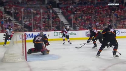 NJD@CGY: Hischier scores goal against Dustin Wolf