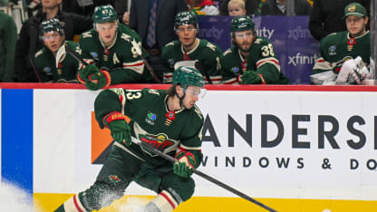 Minnesota Wild defensemen Quinn Hughes (43) controls the puck during the second period of a NHL game between the Minnesota Wild and Boston Bruins on December 14, 2025, at Grand Casino Arena in Saint Paul, MN. (Photo by Nick Wosika/Icon Sportswire via Getty Images)