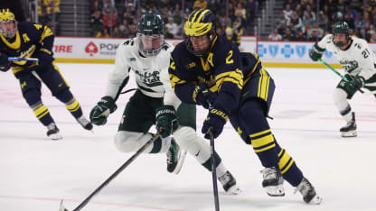 Rutger McGroarty #2 of the Michigan Wolverines tries to get around Maxim Štrbák #8 of the Michigan St. Spartans during the first period at Little Caesars Arena on February 10, 2024 in Detroit, Michigan. (Photo by Gregory Shamus/Getty Images)