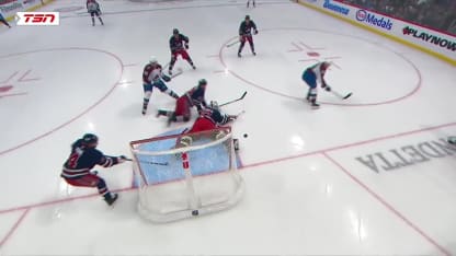 Hellebuyck robs MacKinnon