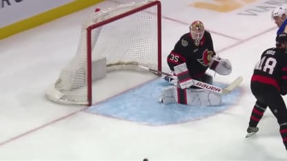 Ullmark stretches for a save