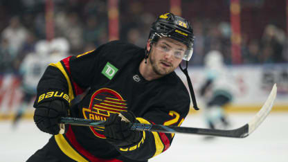 Erik Brannstrom #26 of the Vancouver Canucks watches his shot during the pre-game warmup prior to the start of NHL action against the Seattle Kraken on December, 28, 2024 at Rogers Arena in Vancouver, British Columbia, Canada. (Photo by Rich Lam/Getty Images)