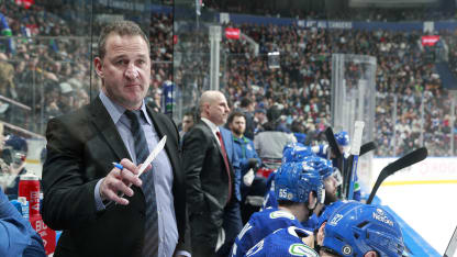 Assistant coach Adam Foote of the Vancouver Canucks looks on from the bench during their NHL game against the Winnipeg Jets at Rogers Arena on March 9, 2024 in Vancouver, British Columbia, Canada. (Photo by Jeff Vinnick/NHLI via Getty Images)