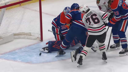 Lardis battles in front for goal