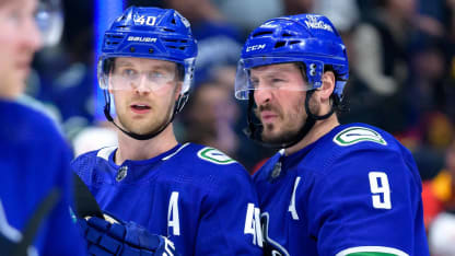 Elias Pettersson #40 and J.T. Miller #9 of the Vancouver Canucks