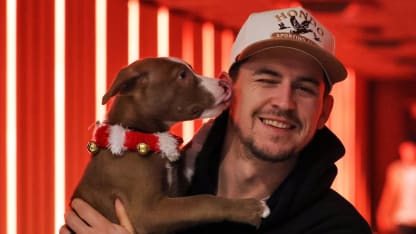 Travis Konecny with puppy