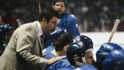 MONTREAL, CANADA - CIRCA 1979: Head Coach Jacques Demers of the Quebec Nordiques talks to his players on the bench at the Montreal Forum circa 1979 in Montreal, Quebec, Canada. (Photo by Denis Brodeur/NHLI via Getty Images)