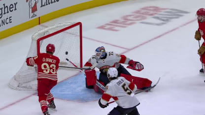 DeBrincat bats the puck home