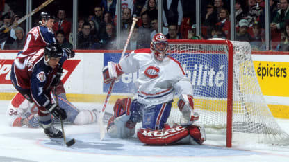 Former Montreal Canadiens goalie Patrick Roy, left, stands with