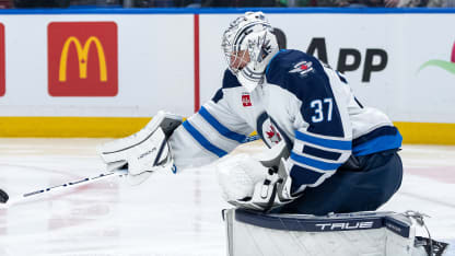 Hellebuyck recovers with insane stick save