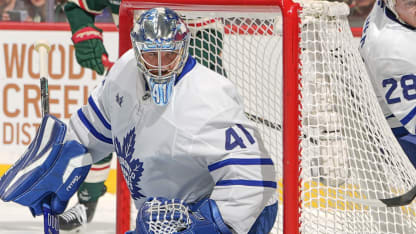 SAINT PAUL, MN - MARCH 15: Matt Boldy #12 of the Minnesota Wild handles the puck with Troy Stecher #28 and Anthony Stolarz #41 of the Toronto Maple Leafs defending during the game at Grand Casino Arena on March 15, 2026 in Saint Paul, Minnesota. (Photo by Bruce Kluckhohn/NHLI via Getty Images)