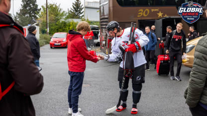 Erik Haula #56 of the New Jersey Devils signs an autograph before practice prior to the 2024 NHL Global Series Challenge on October 2, 2024 in Prague, Czech Republic