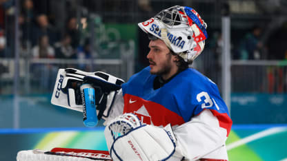 Davide Fadani #35 of Team Italy takes a drink in the third period during the Men's Preliminary Group B match between Italy and Slovakia on day seven of the Milano Cortina 2026 Winter Olympic games at Milano Rho Ice Hockey Arena on February 13, 2026 in Milan, Italy. (Photo by Elsa/Getty Images)