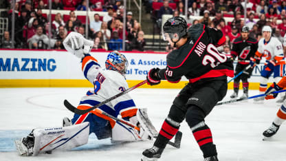 RALEIGH, NORTH CAROLINA - APRIL 04: Center Sebastian Aho #20 of the Carolina Hurricanes shoots against goaltender Ilya Sorokin #30 of the New York Islanders during the first period of the game against the New York Islanders at Lenovo Center on April 4, 2026 in Raleigh, North Carolina. (Photo by Josh Lavallee/NHLI via Getty Images)