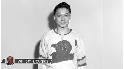Larry Kwong Braves with Douglas badge