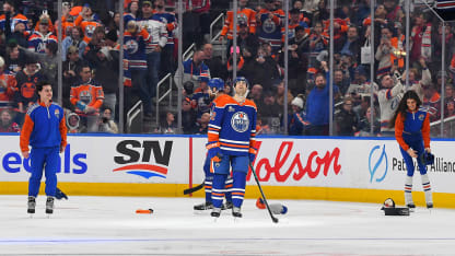 Bouchard goes post and in for hat trick