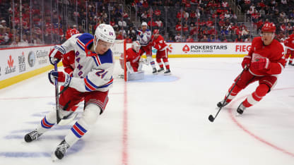 Kaapo Kakko #24 of the New York Rangers looks to gain control of the puck in front of Olli Maatta #2 of the Detroit Red Wings during the third period at Little Caesars Arena on October 17, 2024 in Detroit, Michigan. (Photo by Gregory Shamus/Getty Images)