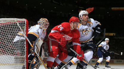 DETROIT, MI - APRIL 25: Goalie Chris Mason #30 of the Nashville Predators leans against the post as teamate Shea Weber #6 ties up Gustav Nyquist #14 of the Detroit Red Wings in front of the net during a NHL game at Joe Louis Arena on April 25, 2013 in Detroit, Michigan. Detroit defeated Nashville 5-2 (Photo by Dave Reginek/NHLI via Getty Images)