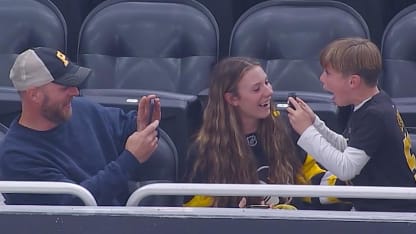Crosby Gives Puck to Excited Fan
