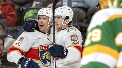 Florida Panthers forward Mackie Samoskevich (25) celebrates his goal with Florida Panthers forward Evan Rodrigues (17) during the first period of an NHL game between the Minnesota Wild and Florida Panthers on December 18, 2024, at Xcel Energy Center in St. Paul, MN. (Photo by Nick Wosika/Icon Sportswire via Getty Images)