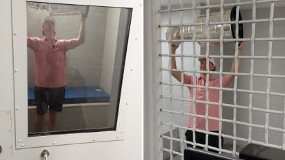 Tkachuck with Cup in jail cell