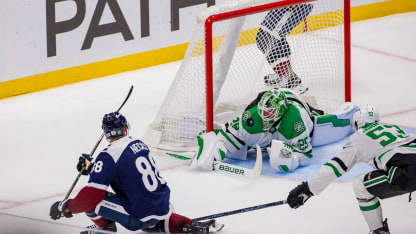 Jake Oettinger #29 of the Dallas Stars makes a save on a shot from Martin Necas #88 of the Colorado Avalanche during overtime in the game at Ball Arena on October 11, 2025 in Denver, Colorado. (Photo by Ashley Potts/NHLI via Getty Images)
