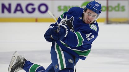 9-23 Quinn Hughes VAN no badge