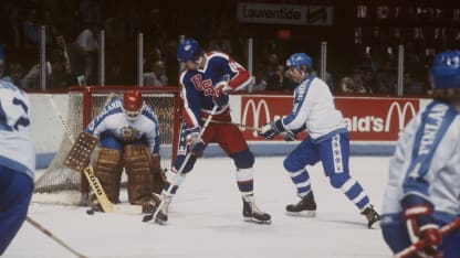 Tapio Levo #8 helps defend the net while goalie Markus Mattsson #13 of team Finland blocks a puck from Rob McClanahan #15 of the United States during a Canada Cup game held at the Montreal Forum circa 1981 in Montreal, Canada. (Photo by Denis Brodeur/NHLI via Getty Images)