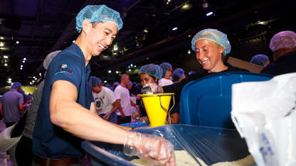 NHL volunteers at NYC Meal Pack for 9-11 Day 3