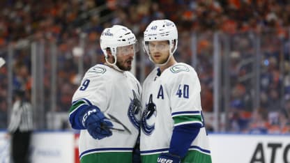 J.T. Miller #9 and Elias Pettersson #40 of the Vancouver Canucks skate against the Edmonton Oilers during the first period in Game Three of the Second Round of the 2024 Stanley Cup Playoffs at Rogers Place on May 12, 2024 in Edmonton, Canada. (Photo by Codie McLachlan/Getty Images)