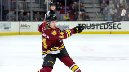 Chicago Wolves right wing Felix Unger Sorum (14) shoots the puck during the third period of the American Hockey League game between the Chicago Wolves and Cleveland Monsters on January 22, 2026, at Rocket Arena in Cleveland, OH. (Photo by Frank Jansky/Icon Sportswire via Getty Images)