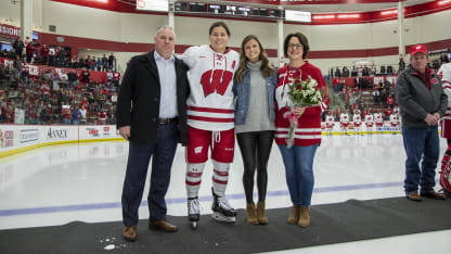 Roque with family at Wisconsin