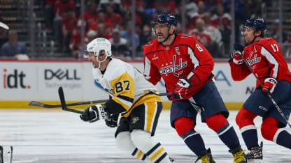 WASHINGTON, DC - APRIL 12: Alex Ovechkin #8 of the Washington Capitals and Sidney Crosby #87 of the Pittsburgh Penguins share a laugh after a face-off to start a game at Capital One Arena on April 12, 2026 in Washington, D.C. (Photo by John McCreary/NHLI via Getty Images)