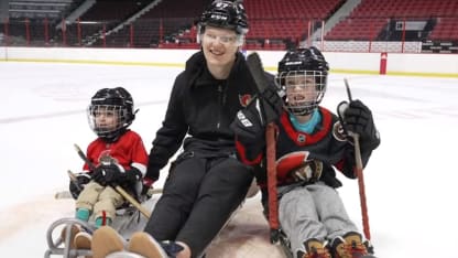 Ottawa Senators Brady Tkachuk plays sled hockey with young fan