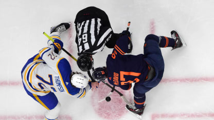 Connor McDavid #97 of the Edmonton Oilers takes a face-off during the game against Tage Thompson #72 of the Buffalo Sabres at Rogers Place on March 21, 2024, in Edmonton, Alberta, Canada. (Photo by Andy Devlin/NHLI via Getty Images)