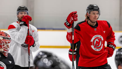 Tomas Tatar #90 and Erik Haula #56 of the New Jersey Devils