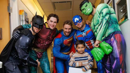 Boston Bruins dress up as superheroes for annual hospital visit