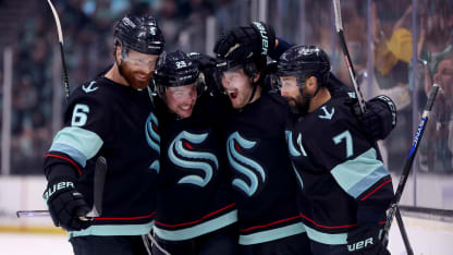 Kraken players celebrate game 6