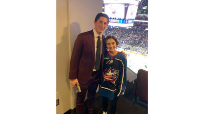 Werenski CBJ with young fan