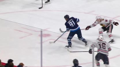 Perfetti ties it in 3rd with goal off mask