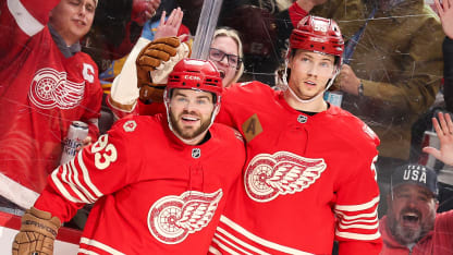 DeBrincat bats the puck home