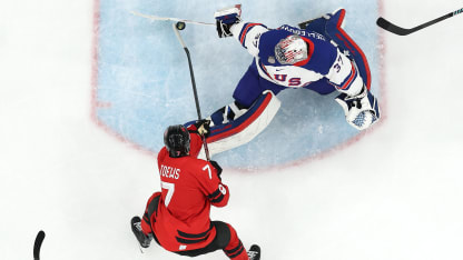 Hellebuyck robs Toews