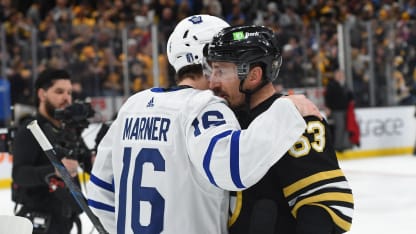 Brad Marchand #63 of the Boston Bruins hugs Mitch Marner #16 of the Toronto Maple Leafs after Game Seven of the First Round of the 2024 Stanley Cup Playoffs at the TD Garden on May 4, 2024 in Boston, Massachusetts. (Photo by Steve Babineau/NHLI via Getty Images)