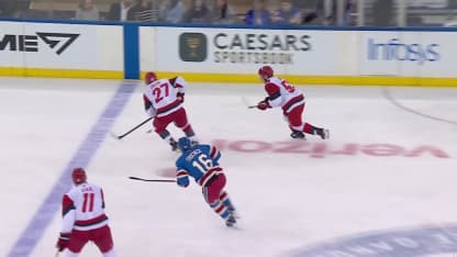 CAR@NYR: Staal scores empty-net goal